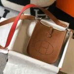Replica Hermes Evelyne Bag Hermes Mini Crossbody Bag 20399 Silver Buckle Tan